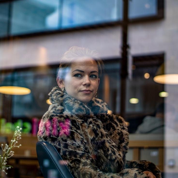 Aryan Kapoor, Client Relations Director, discussing corporate gifting strategy with business clients